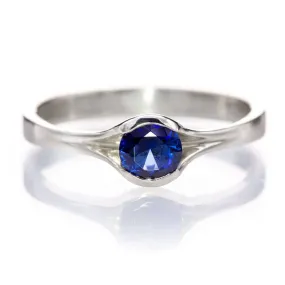 Lab Created 5mm Round Blue Sapphire Half Bezel Fold Solitaire Ring in Sterling Silver, Ready to Ship